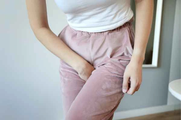 woman running for the toilet because of urinary incontinence Felixstowe